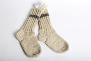 Hand-knitted socks made from homespun wool.